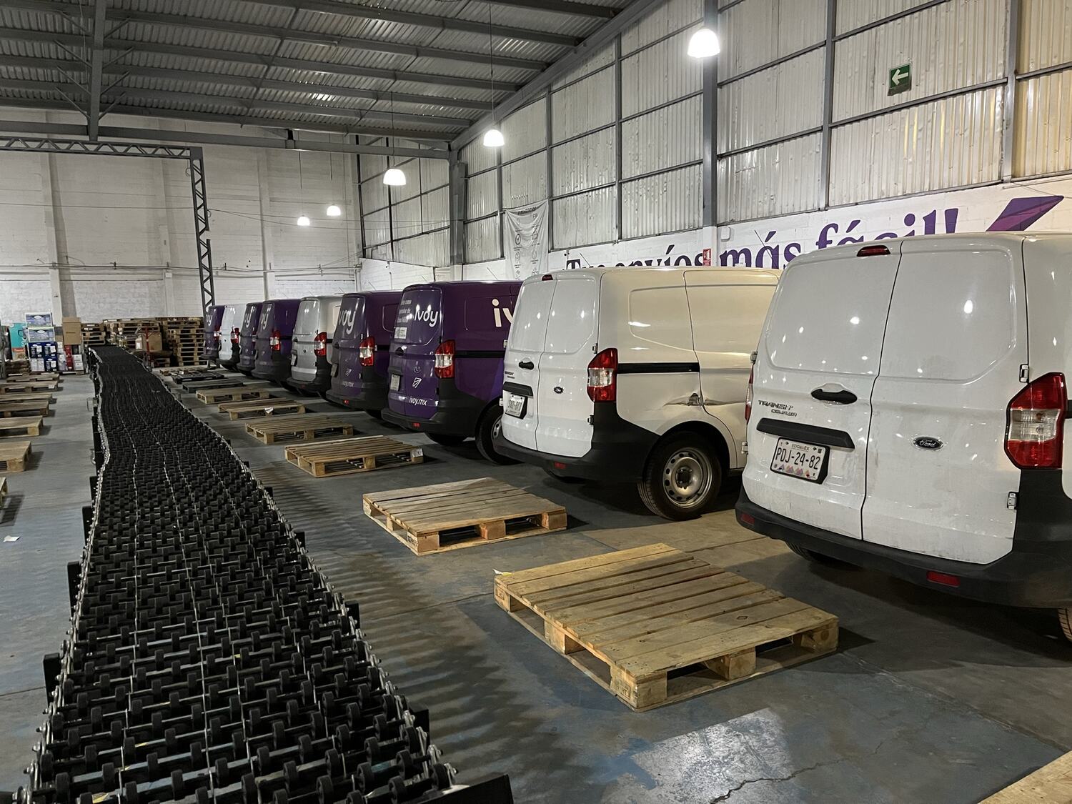 Company-owned vehicles at the warehouse, May 2023.