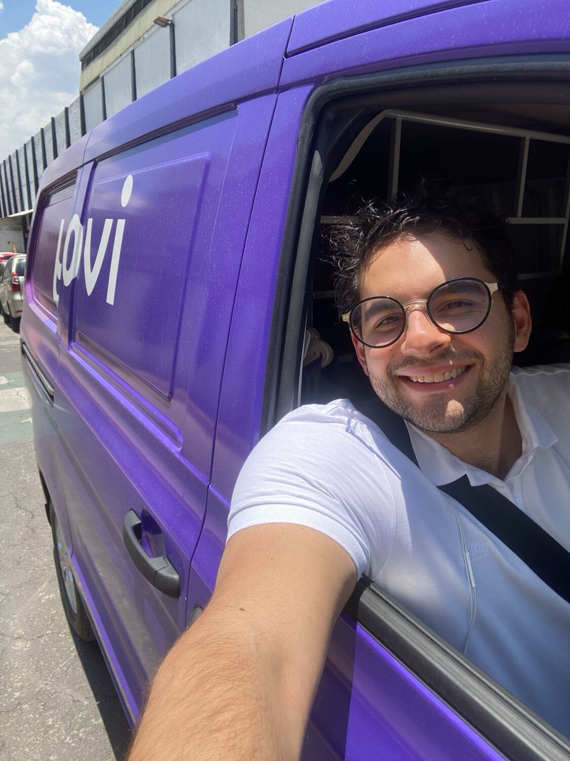 At the wheel of an iVoy van.