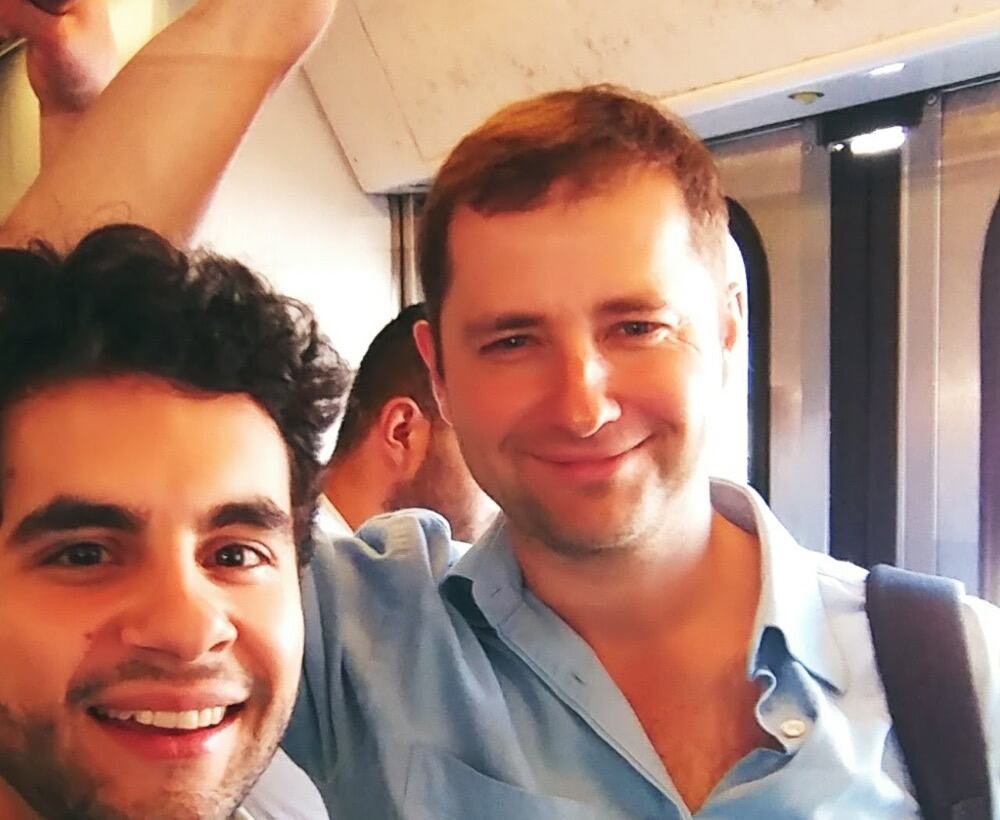 With Pedro, who hired me, on the metro.
